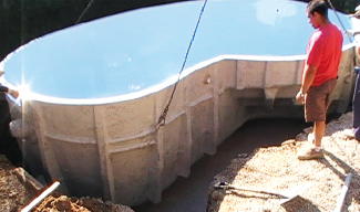 Backfill around polyester shell pool